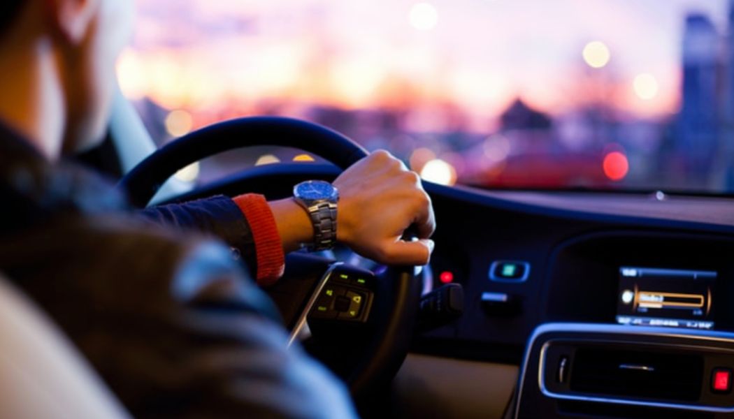 A man driving a car